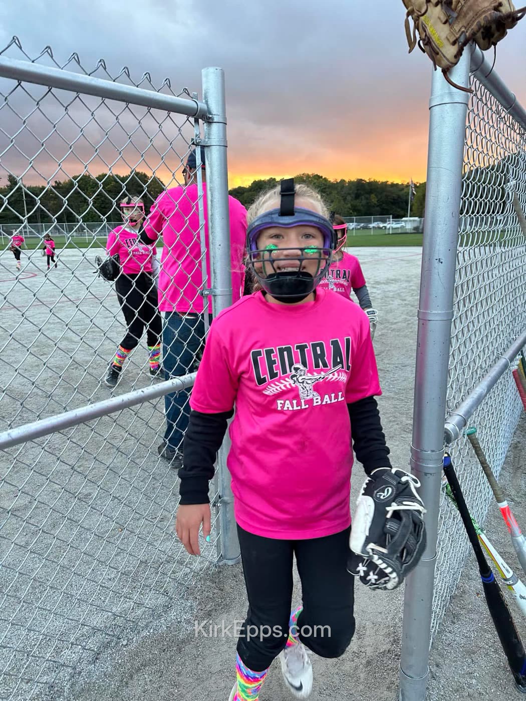 Kirk's daughter heading out to the field for fall softball
