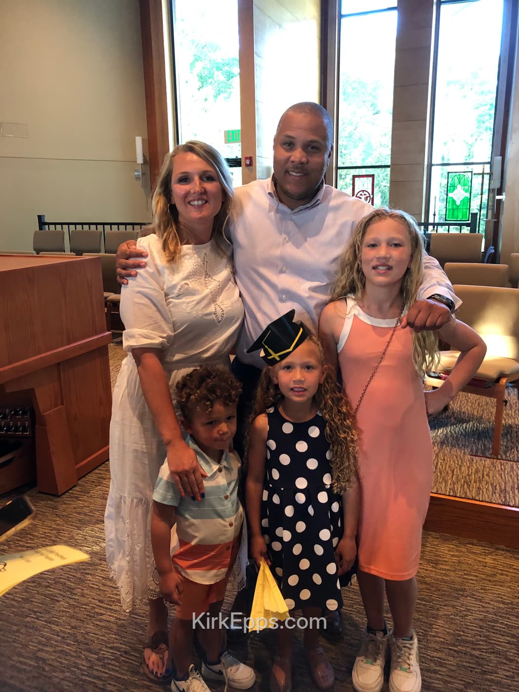 Kirk Epps with his wife and their three kids