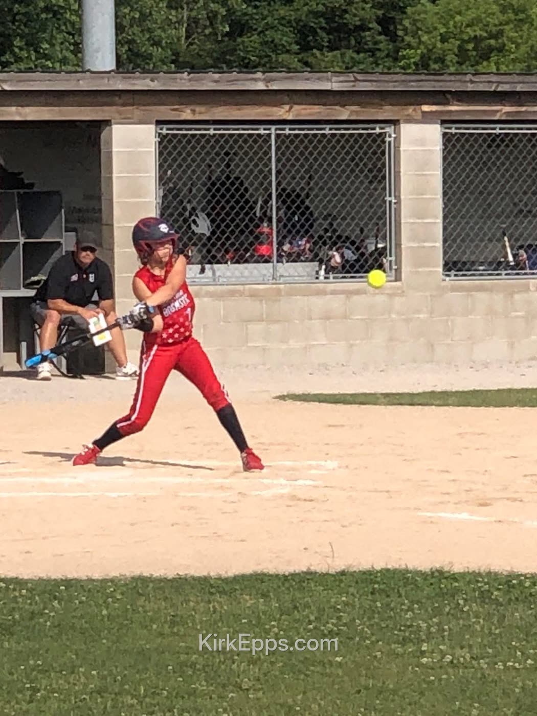 Kirk's daughter at bat in a softball game
